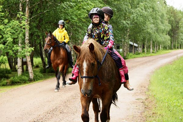 Kids riding a horse